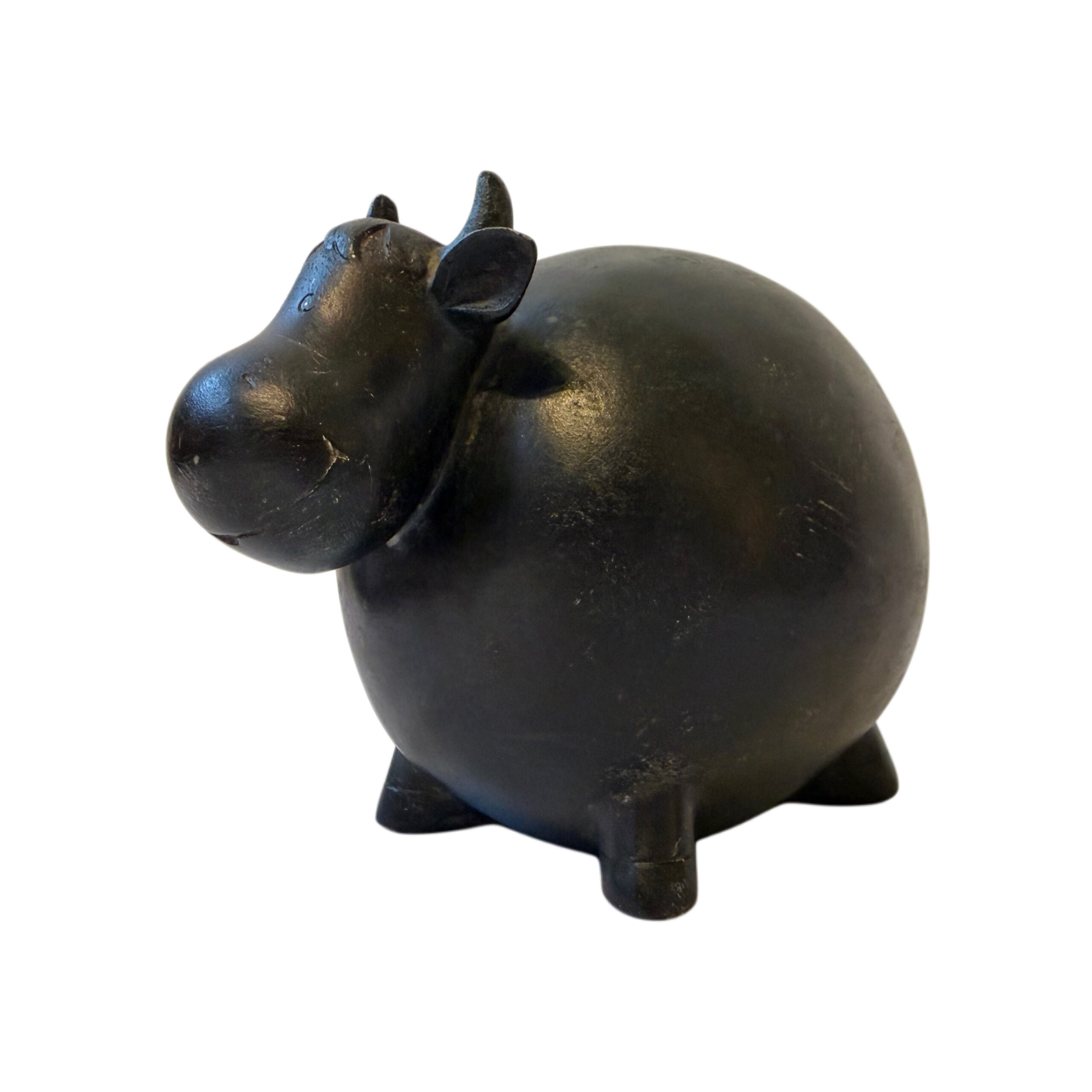 Figura de vaca color negro