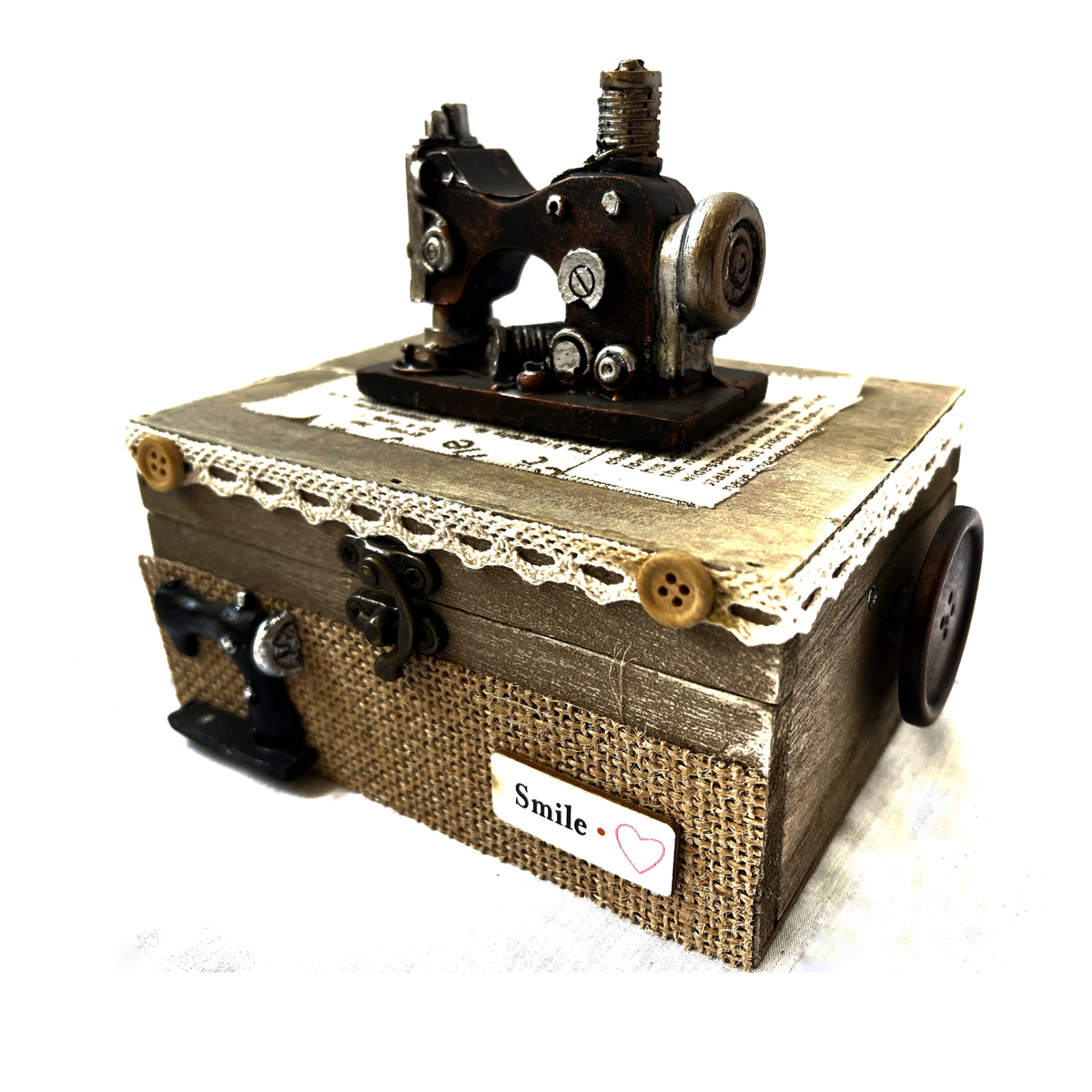 Caja musical de madera con máquina de coser