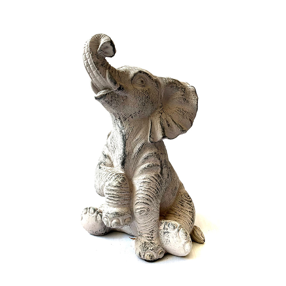 Figura de elefante chico con trompa hacia arriba