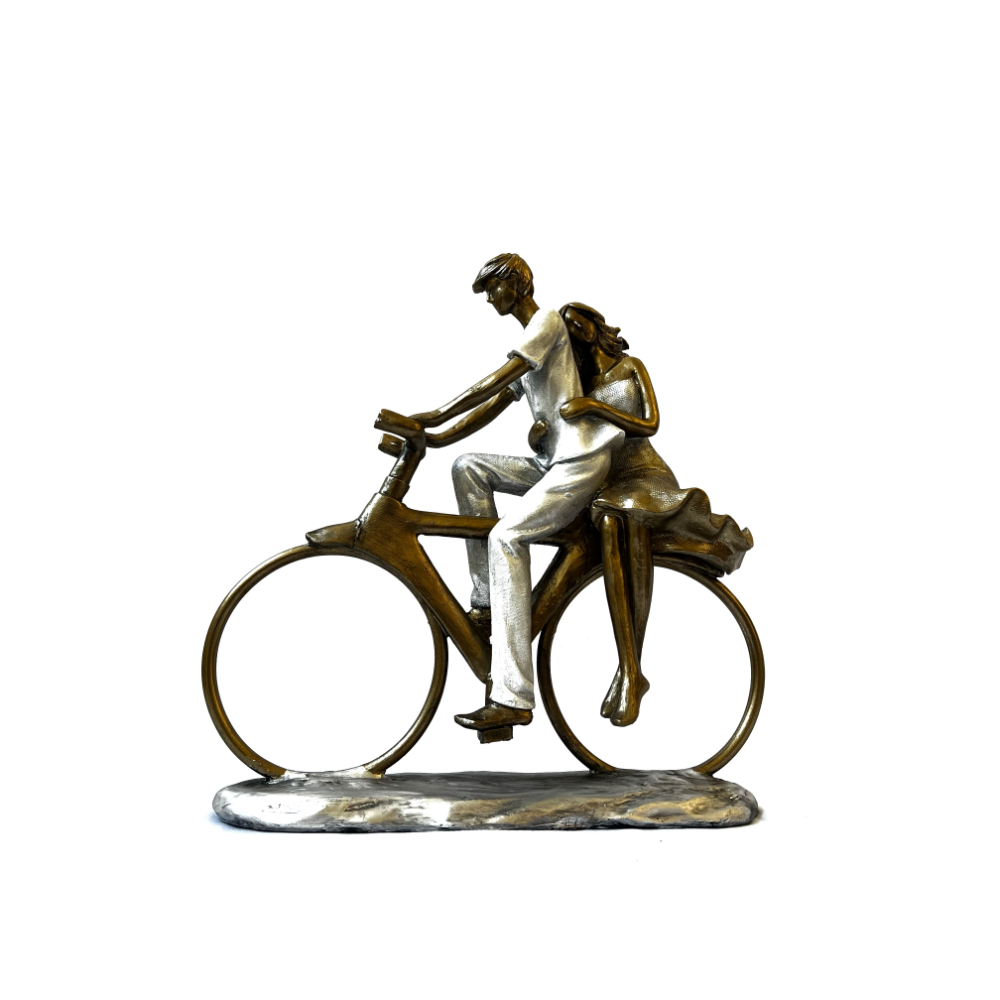 Figura decorativa pareja en bici