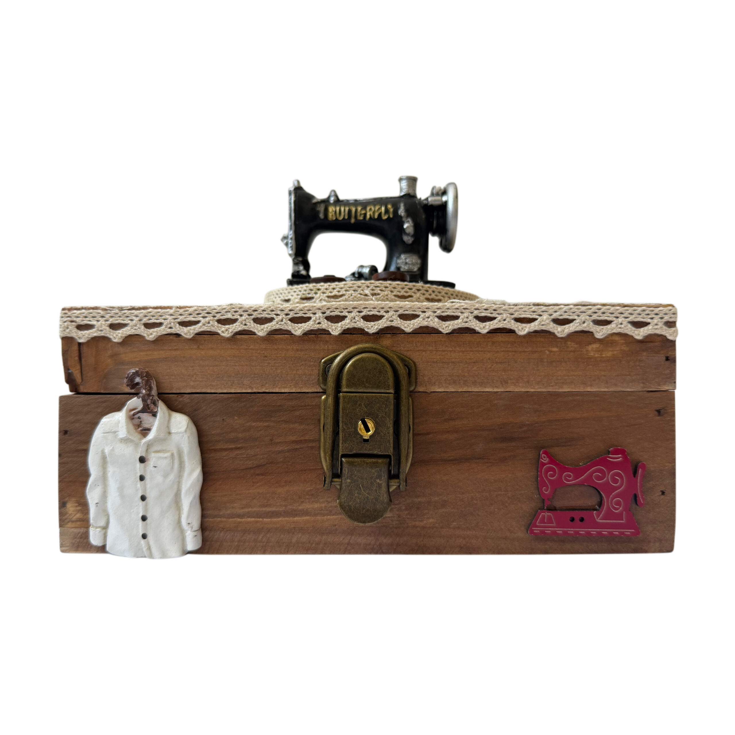 Caja musical de madera con máquina de coser